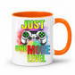 Just One More Level gaming coffee mug showing a colourful controller, rainbow watercolour background and bold "Just One More Level" design, with a orange inner and handle, from Coffee and Moo.