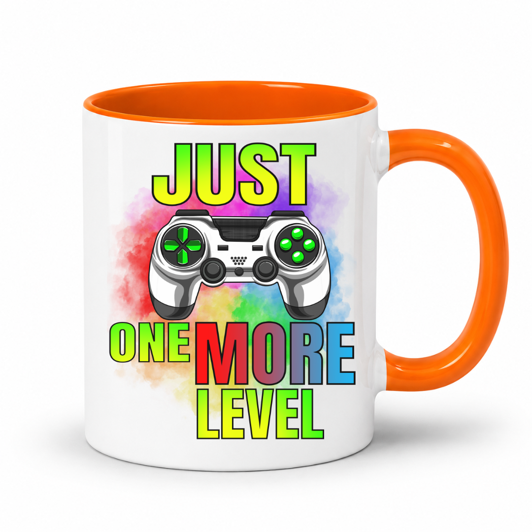 Just One More Level gaming coffee mug showing a colourful controller, rainbow watercolour background and bold "Just One More Level" design, with a orange inner and handle, from Coffee and Moo.