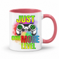 Just One More Level gaming coffee mug showing a colourful controller, rainbow watercolour background and bold "Just One More Level" design, with a pink inner and handle, from Coffee and Moo.