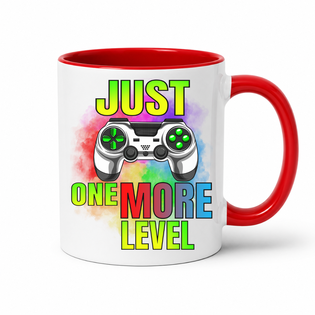 Just One More Level gaming coffee mug showing a colourful controller, rainbow watercolour background and bold "Just One More Level" design, with a red inner and handle, from Coffee and Moo.