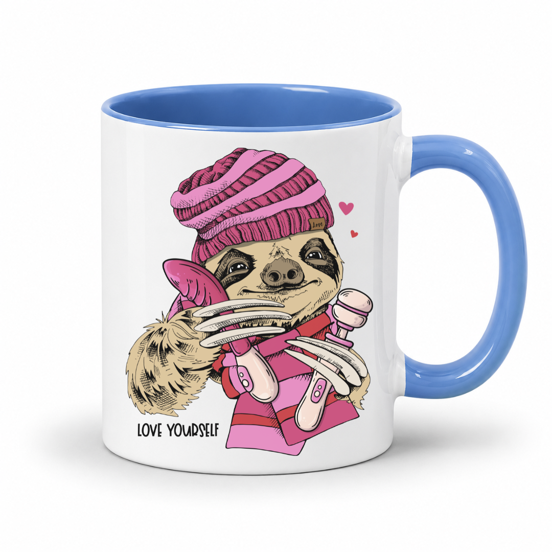A white mug with blue inner and handle featuring  an image of a Naughty Sloth with a pink scarf holding two vibrators, with hearts and Love Yourself lettering, from Coffee and Moo.