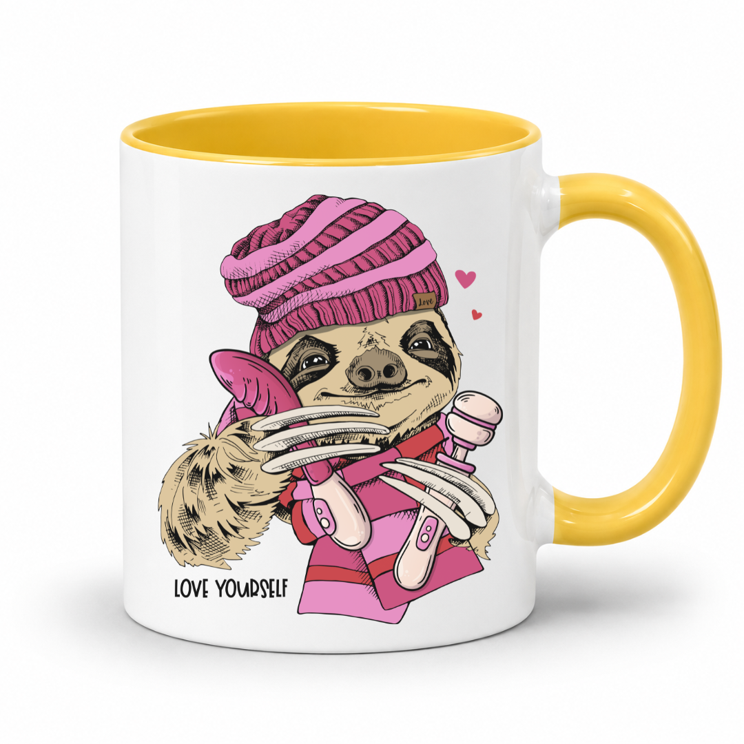 A white mug with yellow inner and handle featuring  an image of a Naughty Sloth with a pink scarf holding two vibrators, with hearts and Love Yourself lettering, from Coffee and Moo.