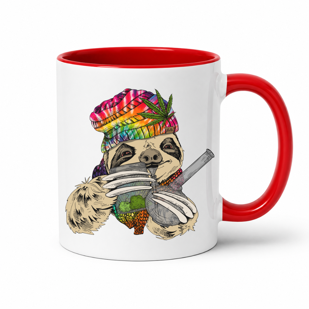 A white ceramic coffee mug with a red handle and red interior, featuring a colorful graphic of a sloth wearing a rainbow-striped beanie with a marijuana leaf and holding a bong & Baggy. Grab your mug from Coffee and Moo NZ.