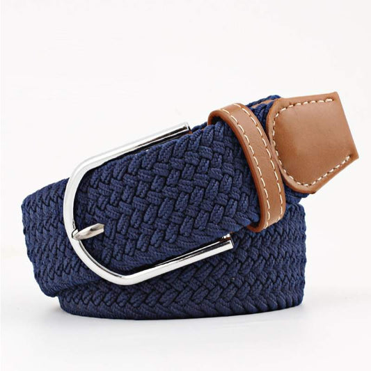 Navy blue woven belt with a brown faux leather trim and silver buckle on a white background. Purchase from Coffee and Moo