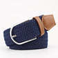 Navy blue woven belt with a brown faux leather trim and silver buckle on a white background. Purchase from Coffee and Moo