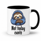 A white ceramic mug with a black handle and black interior, featuring a cartoon sloth in a blue hoodie and the text 'Not today cunts' printed on the front.  from Coffee and Moo.