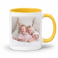 A white ceramic mug with a bright yellow interior and handle, featuring a printed custom family photo on the front, set against a plain white background. Grab your custom photo mug from Coffee and Moo NZ.
