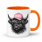 orange handle and inner mug with an image of a black Bossy Highland Cow wearing a Pink Cap. Mug is set on a white background .grab your bossy  mug from Coffee and Moo NZ.