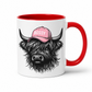 red handle and inner mug with an image of a black Bossy Highland Cow wearing a Pink Cap. Mug is set on a white background .grab your bossy  mug from Coffee and Moo NZ.