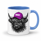 A white ceramic mug with a blue interior and handle, featuring a graphic of a shaggy Highland cow wearing a purple baseball cap with the word 'BOSSY' in white text. Grab your bossy highland coo mug from Coffee and Moo NZ.