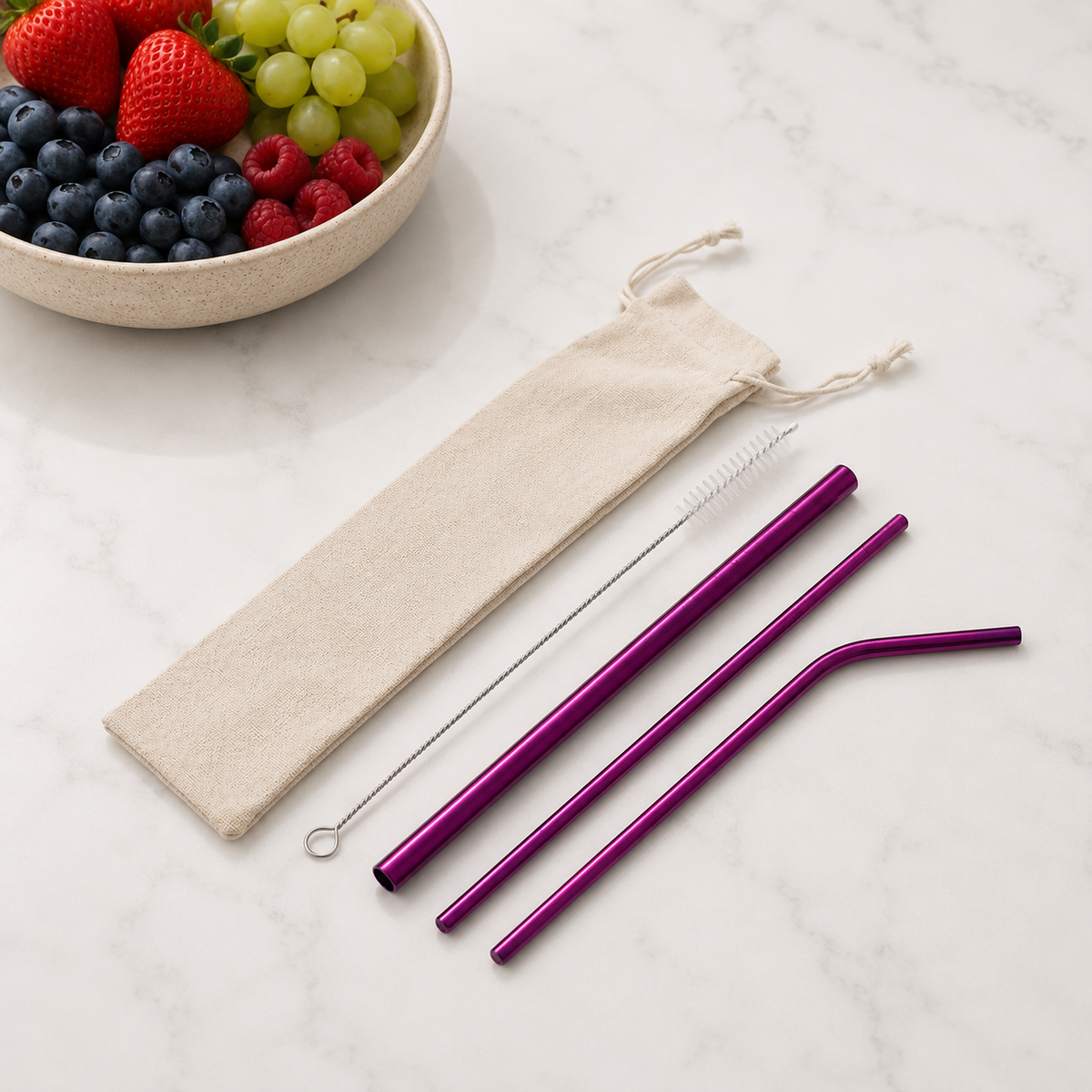 Metallic purple reusable stainless steel straw set featuring three straws, cleaning brush and beige drawstring pouch. From coffee and moo nz.