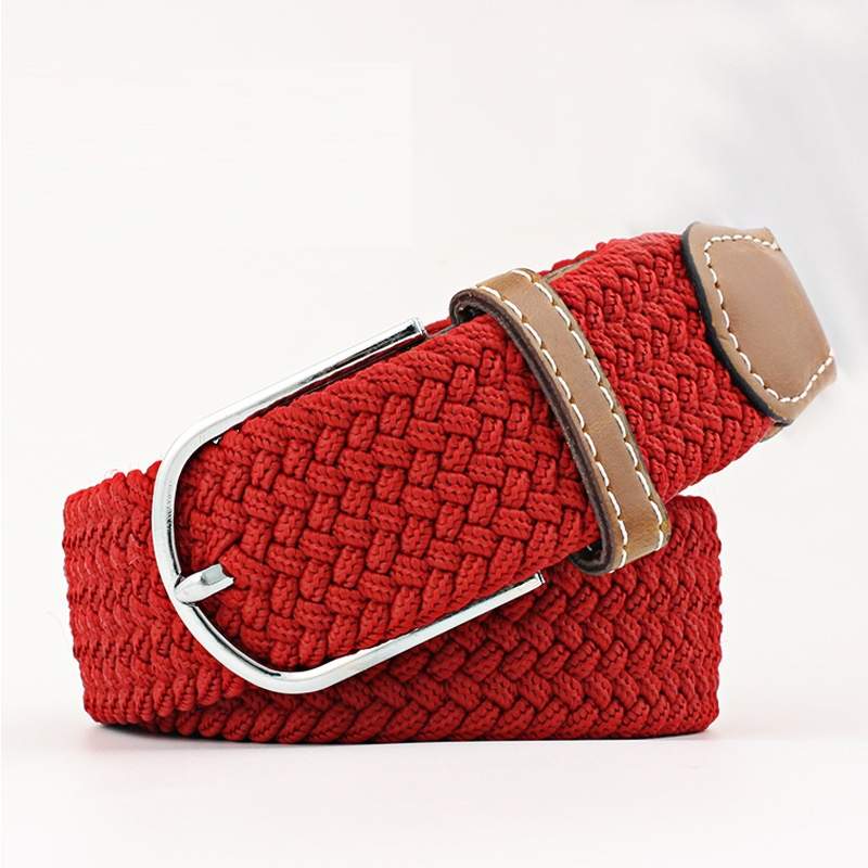 red woven belt with a brown faux leather trim and silver buckle on a white background. Purchase from Coffee and Moo