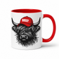 A white ceramic mug with a red interior, red handle, and a graphic of a shaggy Highland cow wearing a red cap with the word 'BOSSY' in white, shown on a clean white background. Grab your Bossy highland coo mug from Coffee and Moo NZ.