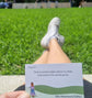The Getting Lost Solo Adventurers Edition is your ultimate permit to escape the noise, skip the group compromises, and explore the world entirely at your own pace.  the image shows a card saying Find a comfortable place to relax and watch the world go by. Grab your game from Coffee and Moo NZ