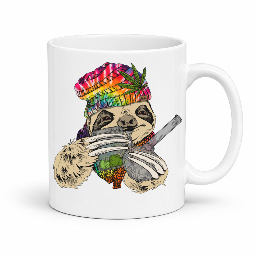 A white ceramic mug featuring a colorful illustration of a sloth with red eyes, wearing a rainbow tie-dye beanie and holding a bong and baggy. Grab your mug from Coffee & Moo NZ