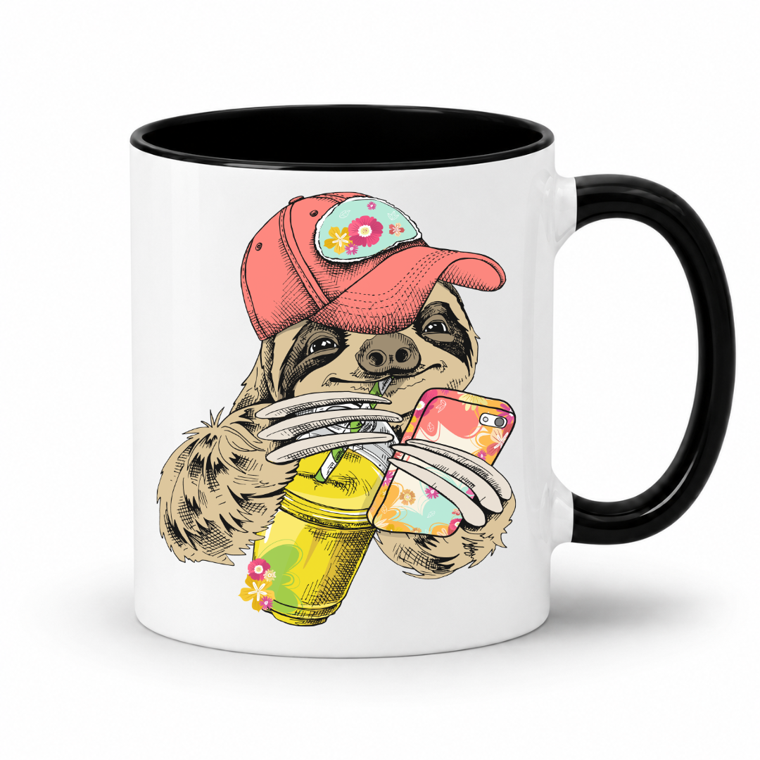 A white ceramic mug with a black interior and black handle, with a colorful illustration of a sloth wearing a coral coloured cap and holding a loaded-tea drink and a phone, set on a  white  background. Grab yours from Coffee and Moo NZ.