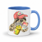 A white ceramic mug with a blue interior and blue handle, with a colorful illustration of a sloth wearing a coral coloured cap and holding a loaded-tea drink and a phone, set on a  white  background. Grab yours from Coffee and Moo NZ.