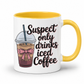 A white ceramic coffee mug with a yellow interior and handle, featuring a cartoon iced coffee cup and the text 'Suspect only drinks iced Coffee' in black script. From Coffee and Moo NZ.