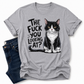 A grey short-sleeve t-shirt with a graphic of a black and white cat and the text 'THE FUCK YOU LOOKING AT?' printed on the front, styled flat-lay next to a pair of dark blue jeans on a white background. Grab your feral tee from Coffee and Moo NZ.