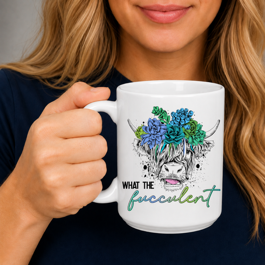 Female holding What the Fucculent Highland Cow Coffee Mug, highlighting the botanical cow artwork, from Coffee and Moo NZ