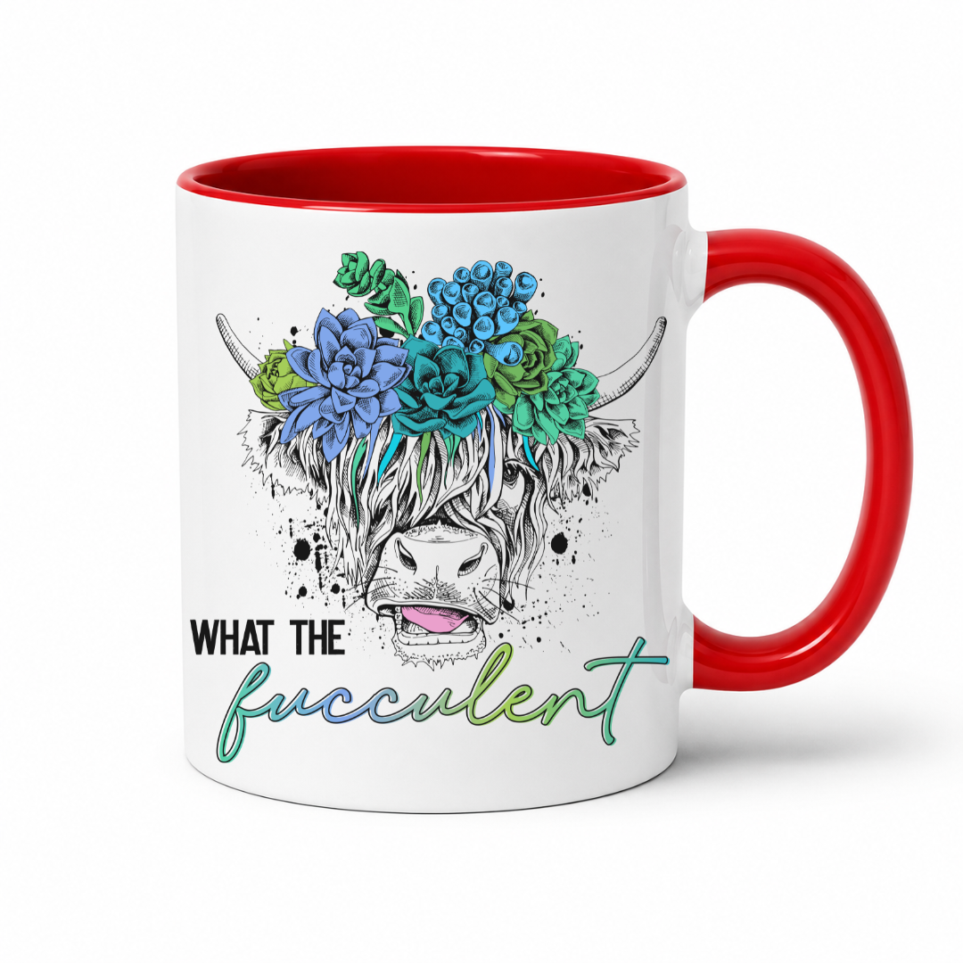 A white ceramic mug with a red interior and red handle, featuring a graphic of a highland cow with blue and green succulents in its horns and the text 'WHAT THE fucculent' printed below. from Coffee and Moo NZ.