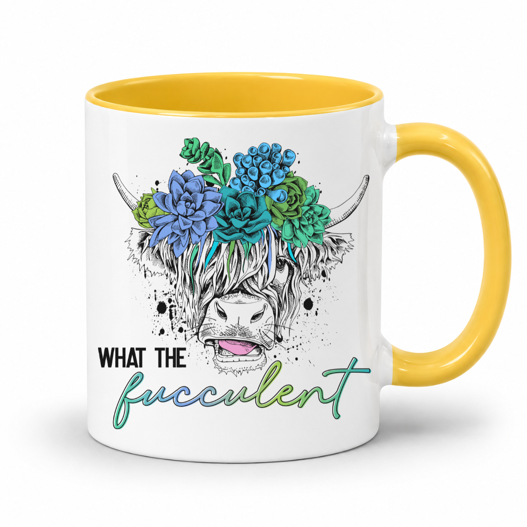 A white ceramic mug with a yellow interior and yellow handle, featuring a graphic of a Scottish highland cow wearing a blue and green succulent flower crown, with the text 'WHAT THE fucculent' printed below. from Coffee and Moo NZ.