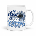 You Are Enough Floral Ceramic Mug featuring bold blue lettering and blue floral blooms, Purchase yours from Coffee and Moo.